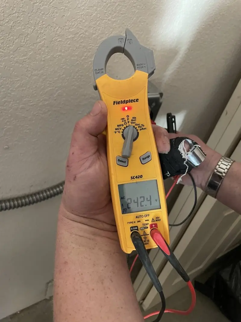 Voltage testing with clamp meter during Hot Tub / Pool Electrical Wiring in Southampton